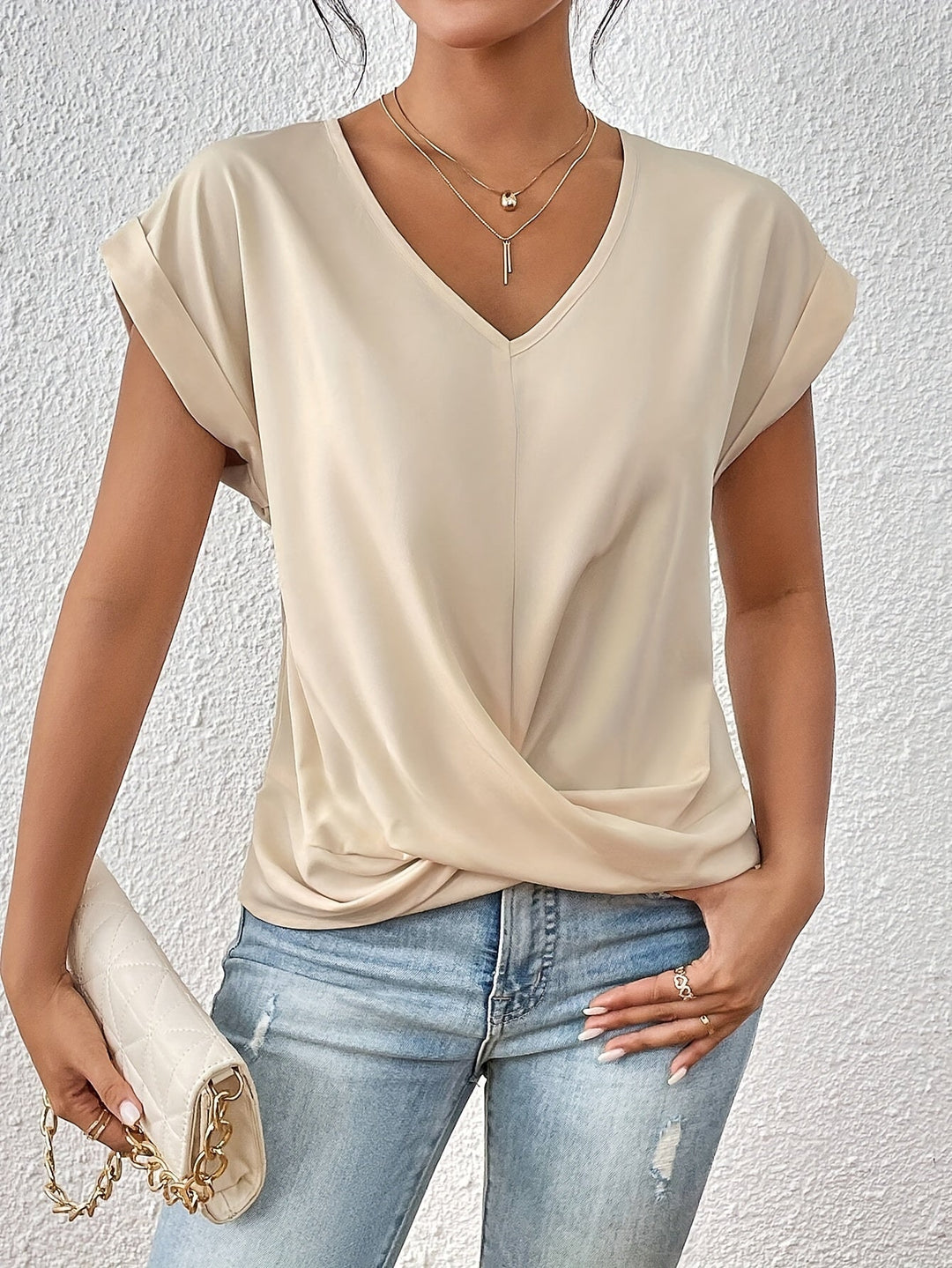 Damenbluse mit gedrehtem Saum und V-Ausschnitt