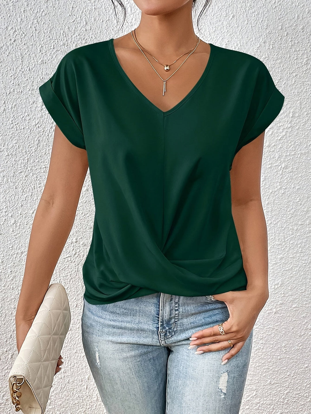 Damenbluse mit gedrehtem Saum und V-Ausschnitt